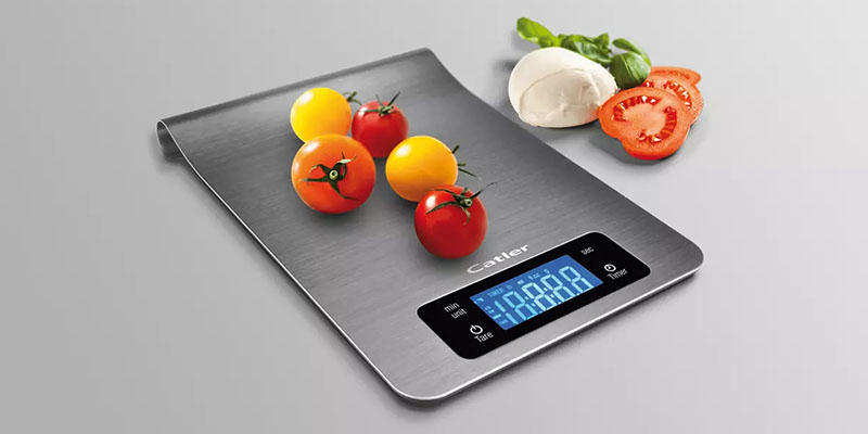 digital scale and fruits